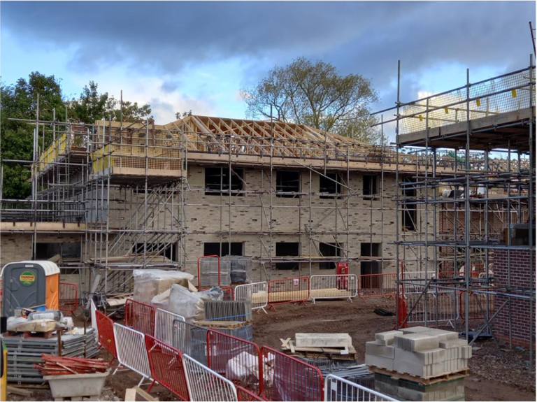 View of Care Home. Trusses ready for felt, batten and tiling